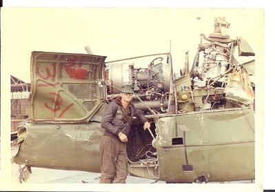 Rick_Aydt_with_Huey_after_Shot_Down~0.jpg